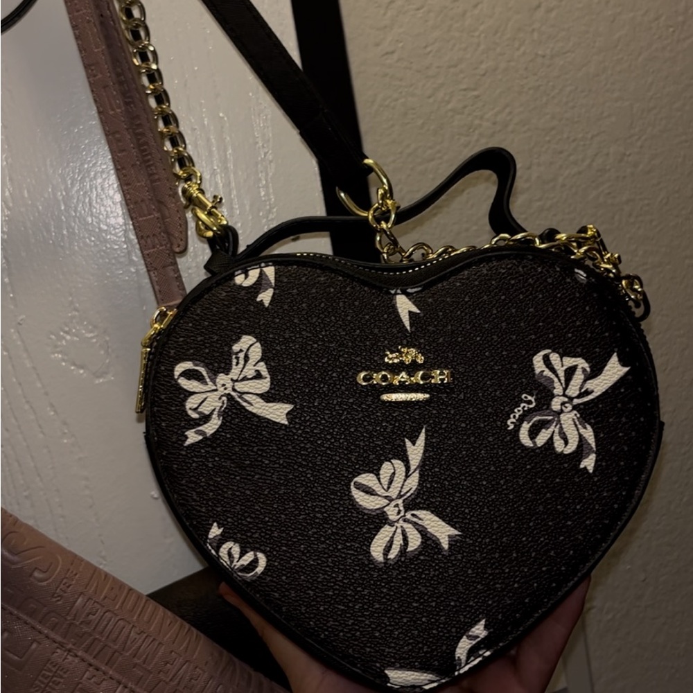 COACH Black Heart-Shaped Mini Crossbody with White Bow Print